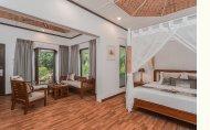 Bandos Island Resort and Spa Maldives Deluxe Beachfront Room Bandos Island Resort and Spa Maldives Deluxe Beachfront Rooms